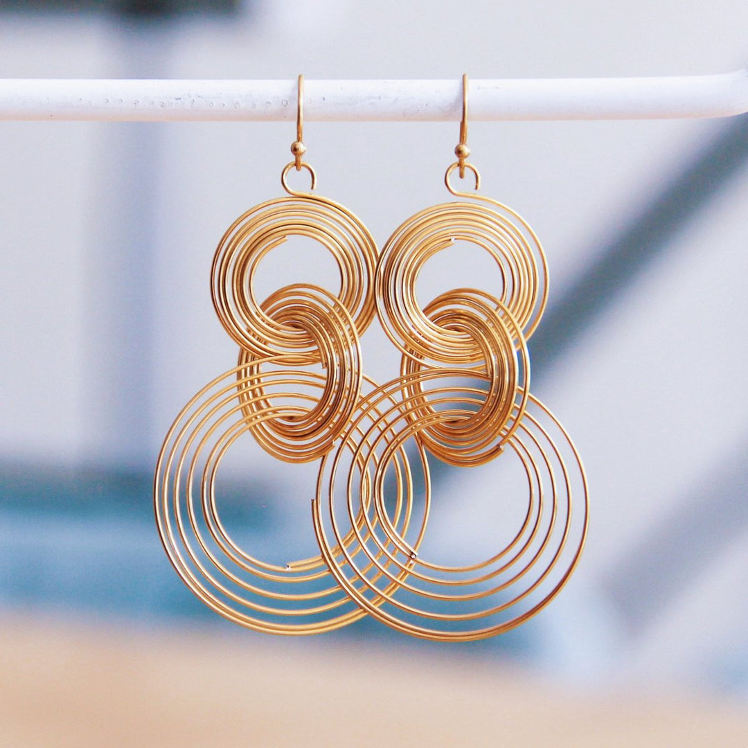 Statement Ohrringe - TWISTED RINGS - Gold