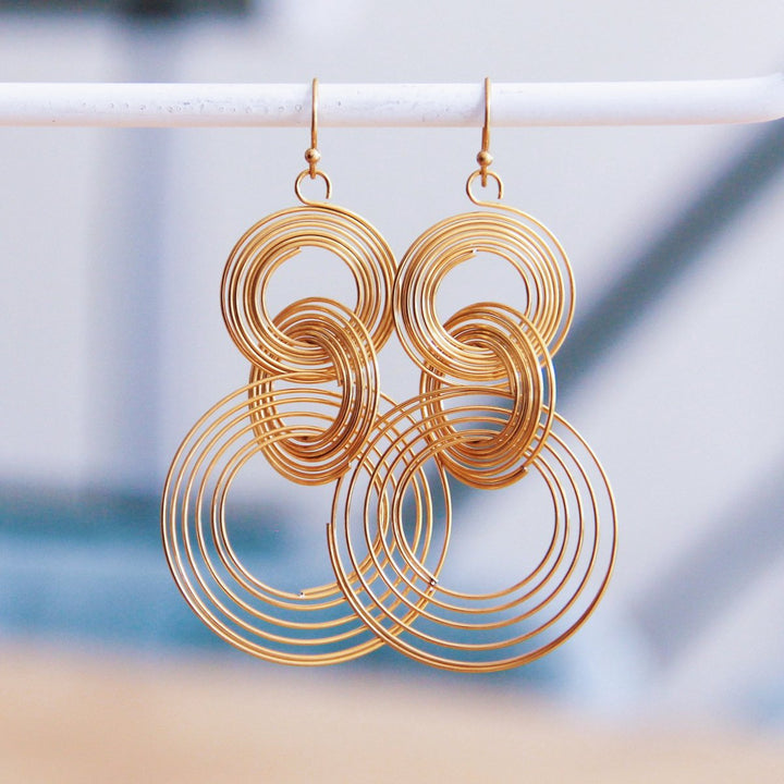 Statement Ohrringe - TWISTED RINGS - Gold